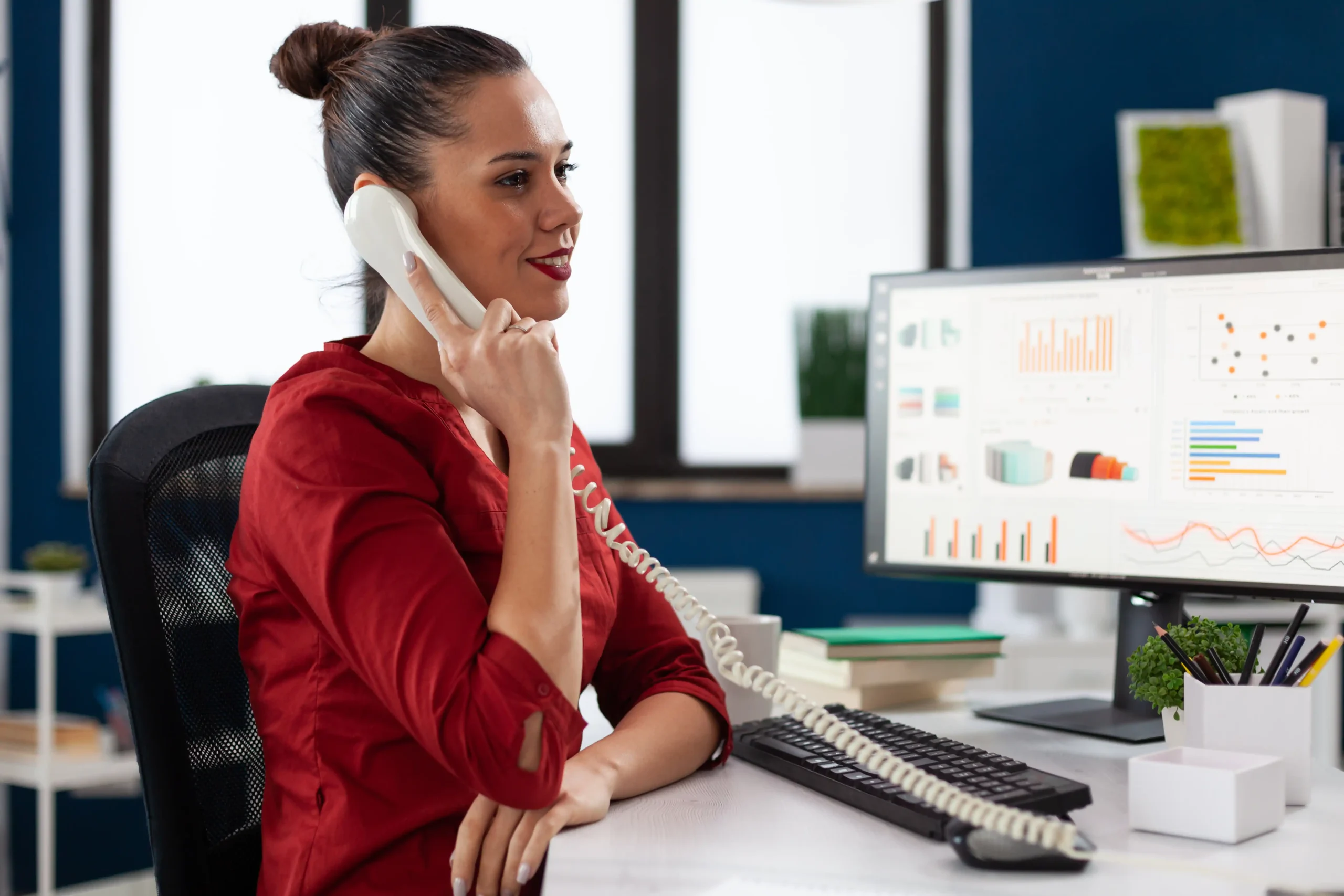 businesswoman-sitting-desk-corporate-office